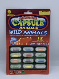 Игрушки - растушки в капсулах разных животных на листе 12 шт  35-45 мм  (цена указана за планшет 12 шт)